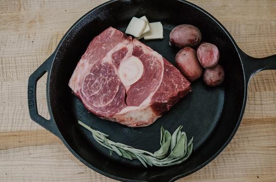 Steak in a cast iron skillet from D&D Beef in Nebraska